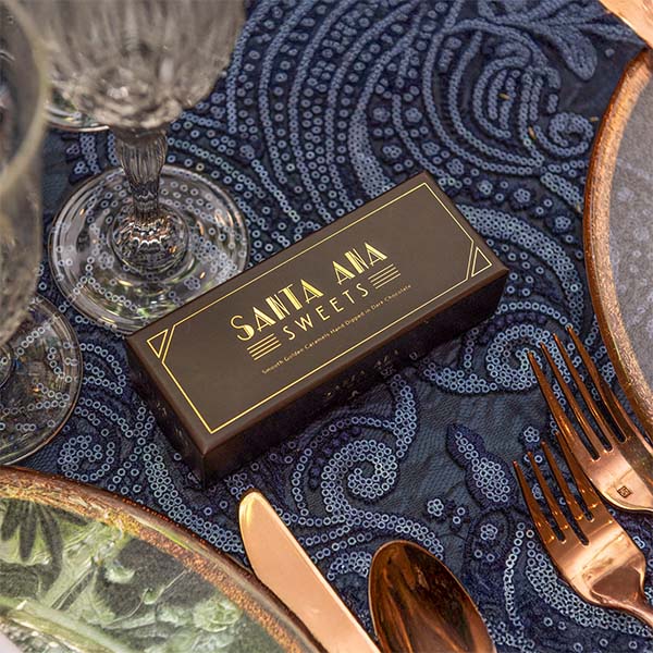 Glamour shot of Three piece box of Santa Ana Sweets chocolate covered salted caramels | Santa Ana Sweets