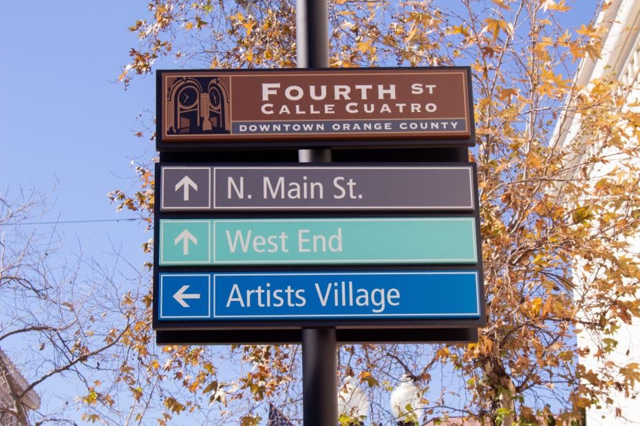 A street sign in Downtown Orange Country, pointing you to all the fun things to do in Santa Ana