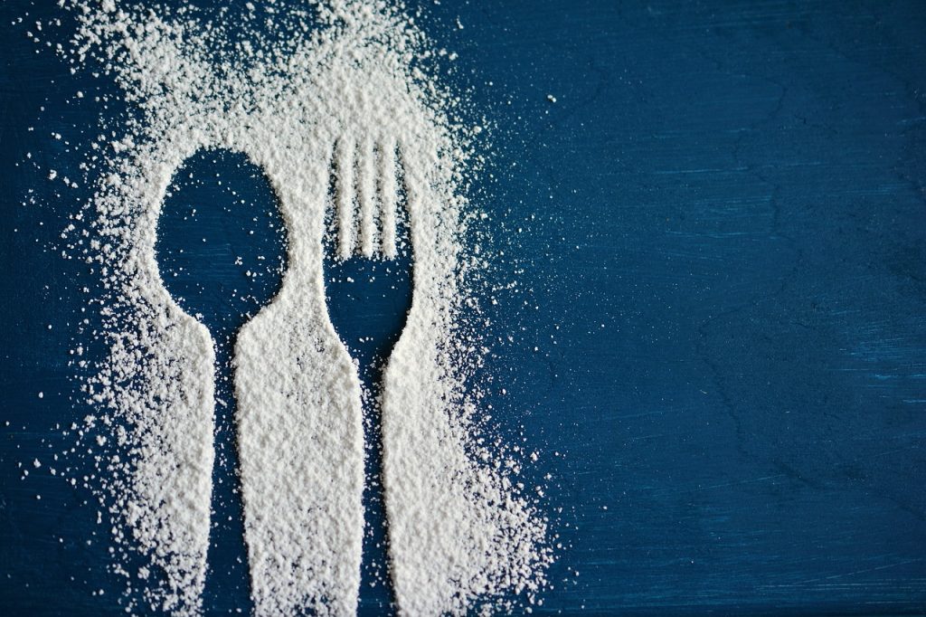 spoon and fork outline in sugar