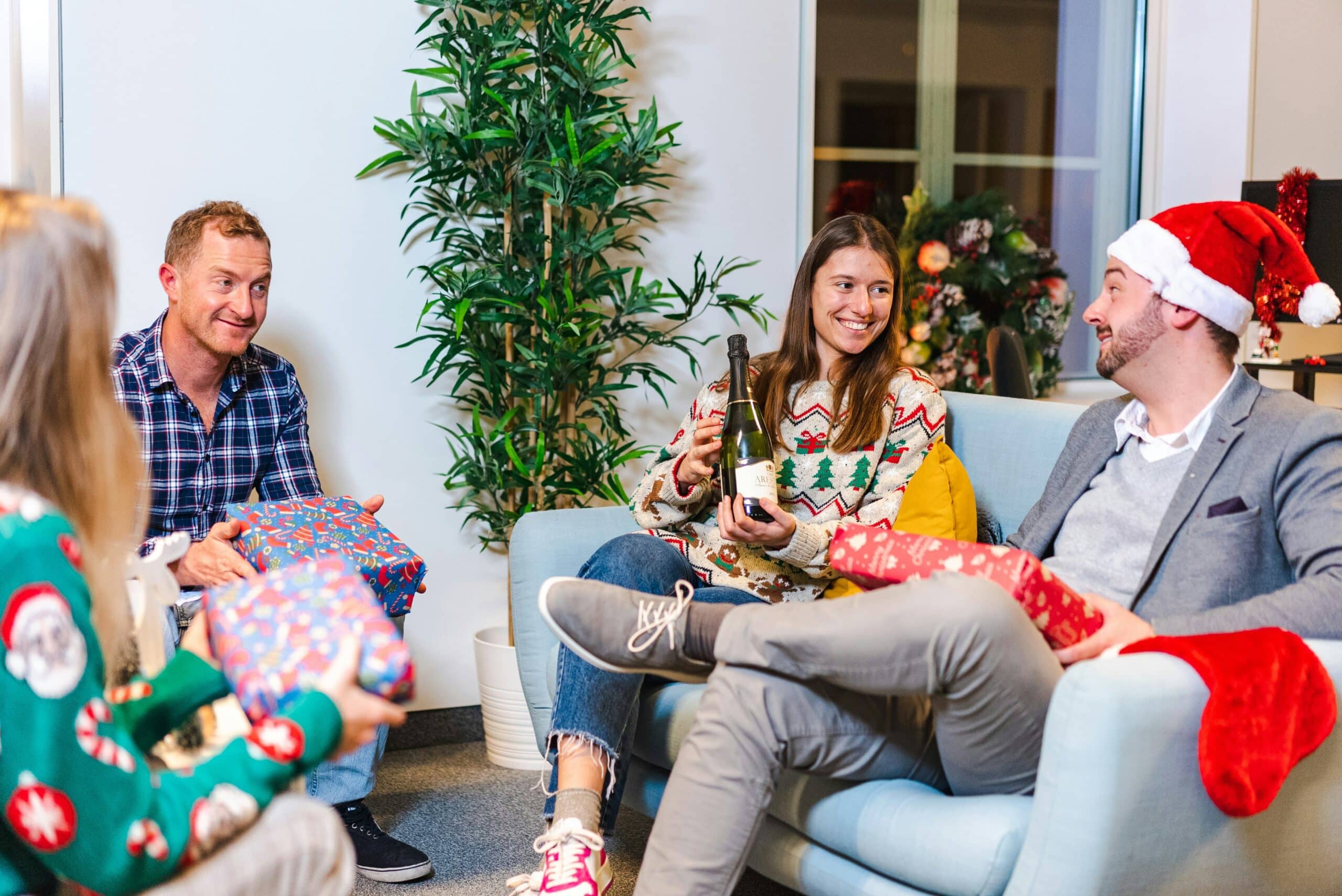 A group of people doing a gift exchange